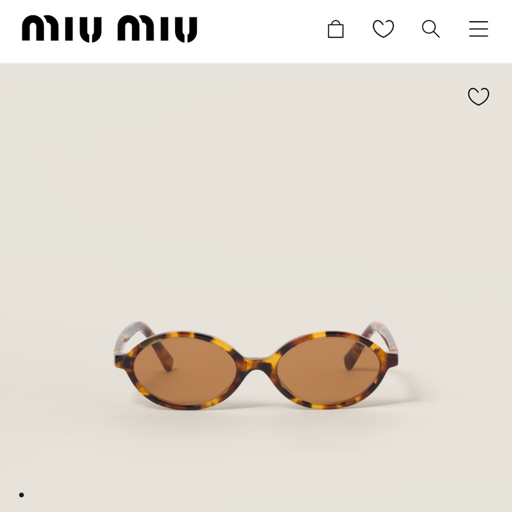 Miu Miu Tortoise Shell Oval Sunglasses